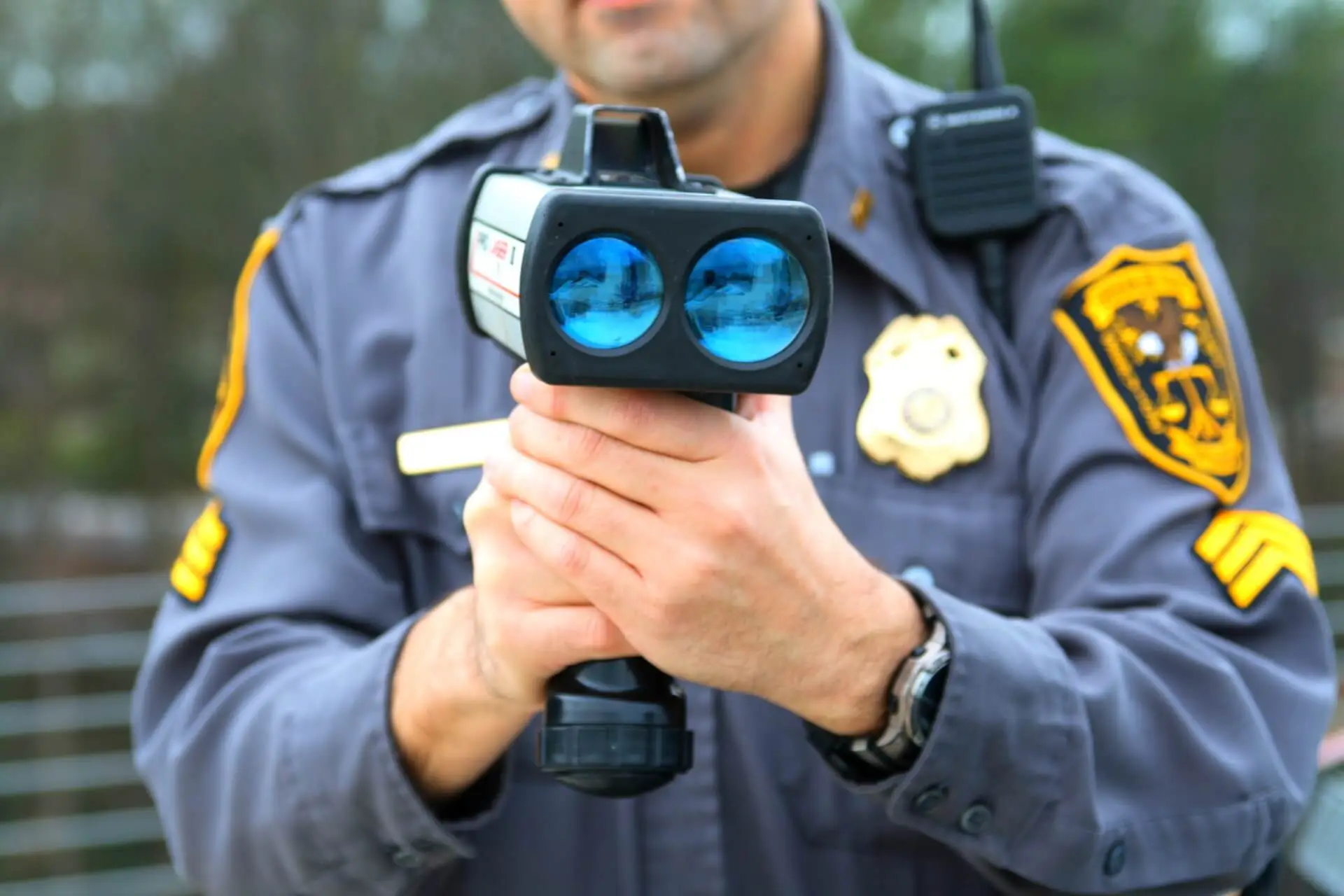 Police Officer Using Radar Gun