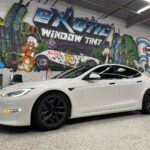 Picture of white Tesla after window tint installation