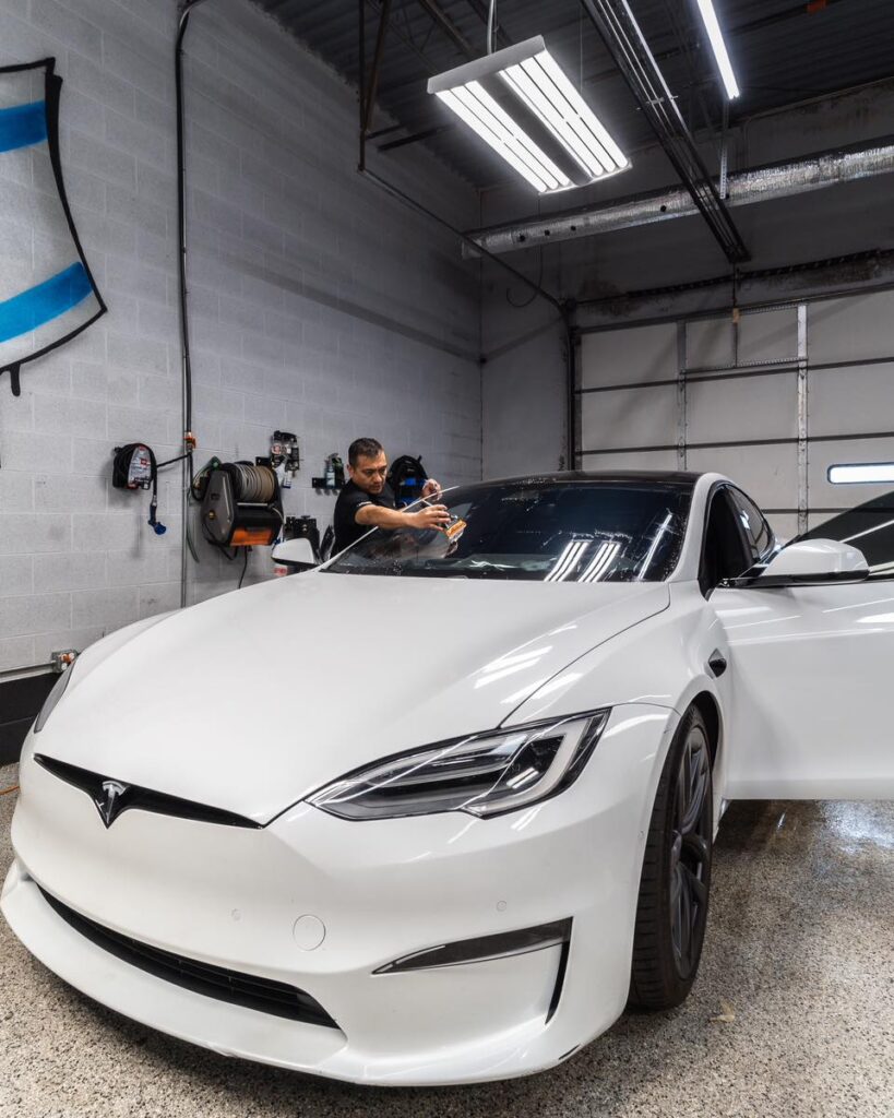 Picture of white Tesla having window tint installed at Exotic Window Tint