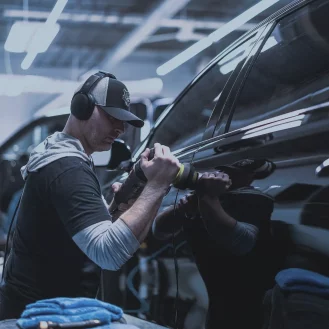 Picture of man polishing a car at Exotic Window Tint